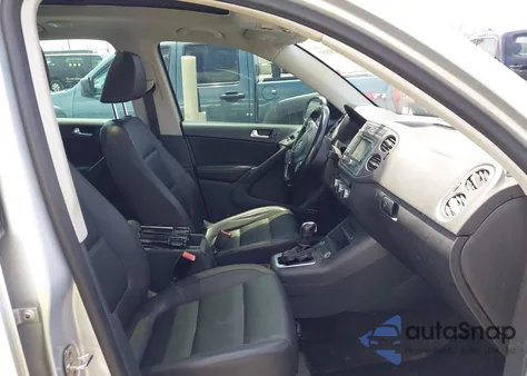 2014 Volkswagen Tiguan Sel z USA, uszkodzony, nr VIN WVGAV3AX2EW557480